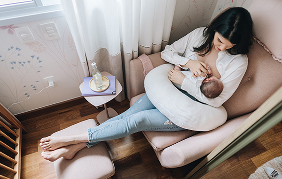 Mother breastfeeding baby